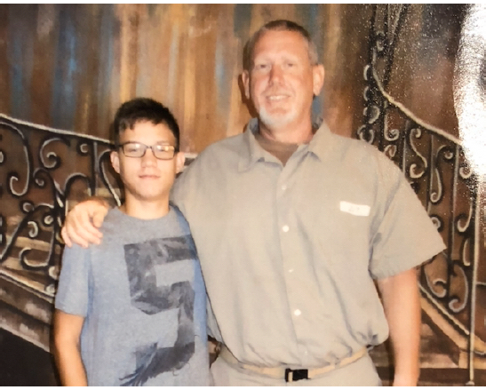 Photo of John Caylor with family